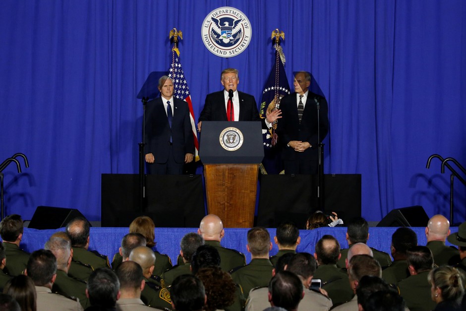 President Trump summarizes his executive orders on immigration at the Department of Homeland Security headquarters in Washington D.C., with Vice President Mike Pence (on the left) and DHS head General John Kelly (to his right).