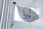 The Japan Display Inc. corporate flag files outside the company's plant in Mobara, Chiba Prefecture, Japan.