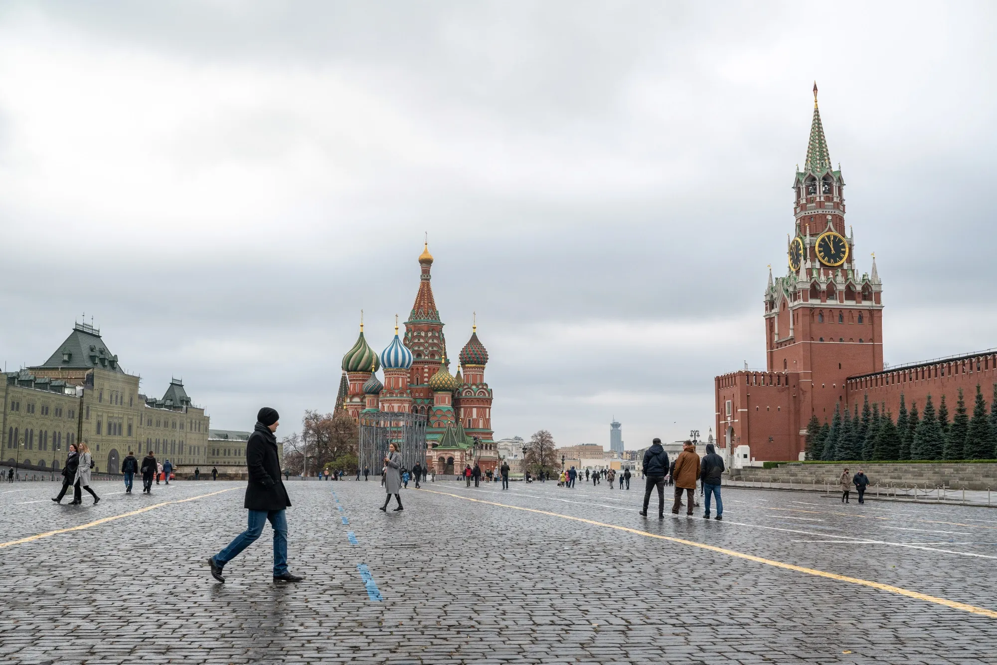 Visitors walk through Red Square in Moscow.