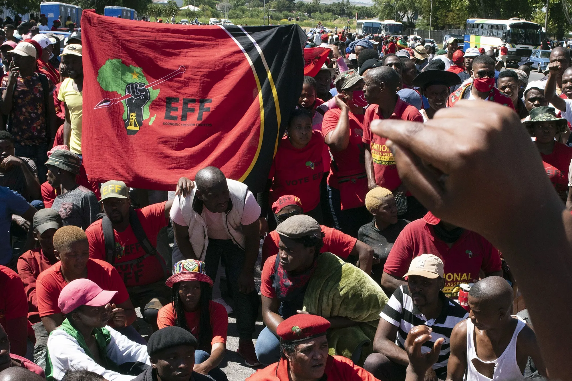 Economic Freedom Fighters members demonstrate near Brackenfell High School in Cape Town on Nov. 20