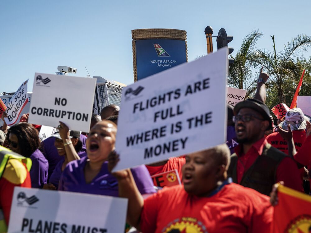 South African Airways workers and union members picket outside O.R. Tambo International Airport in Johannesburg, on Nov. 15.