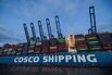 A COSCO cargo ship at the Port of Felixstowe, UK.