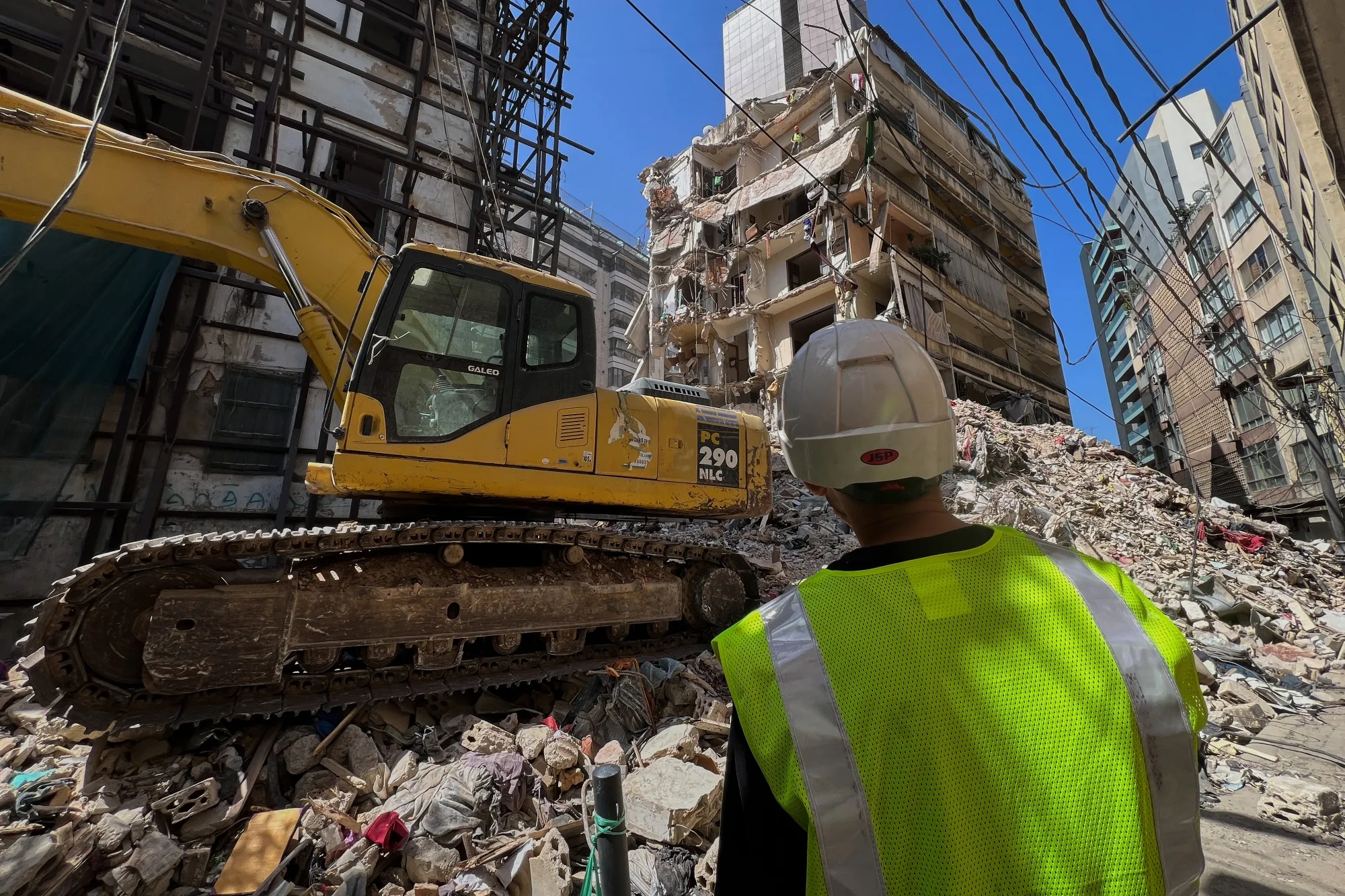 Rescue workers at the site of an Israeli airstrike, in Beirut, on April 13.