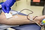 Blood is drawn from a donor during a blood drive in Princeton, Illinois.