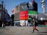 Digital billboards at Piccadilly Circus in London.