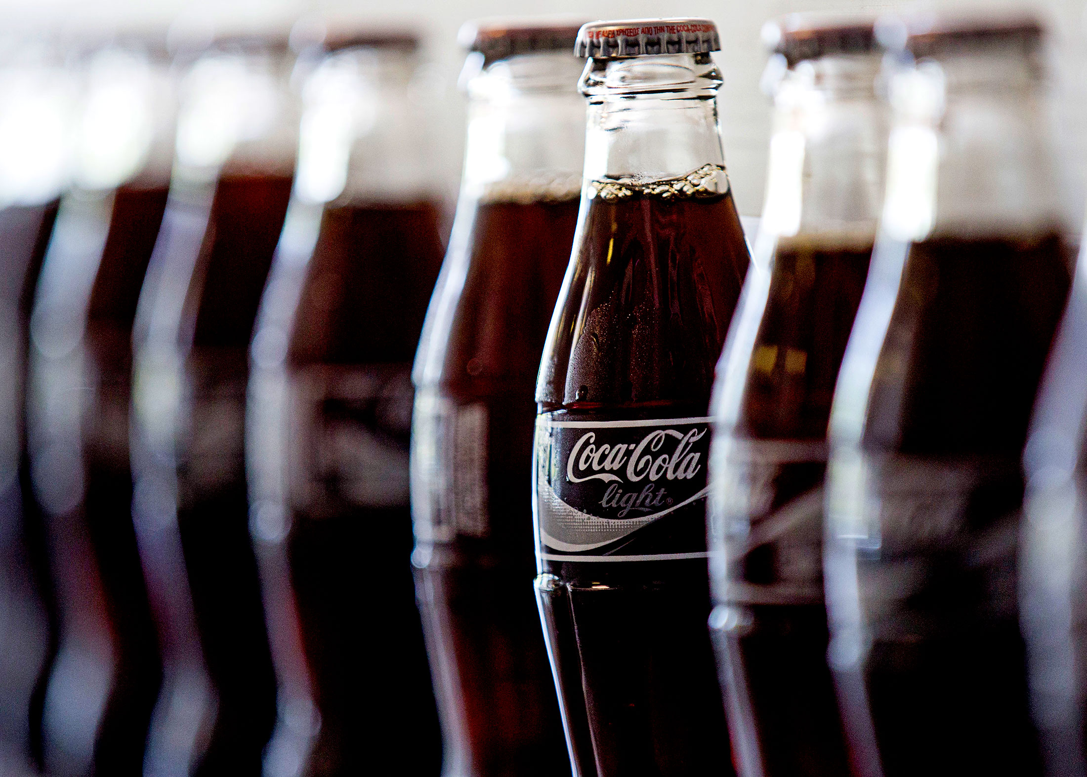 Coke Falls Flat at Court With EU Trademark Bid for Bottle Shape - Bloomberg