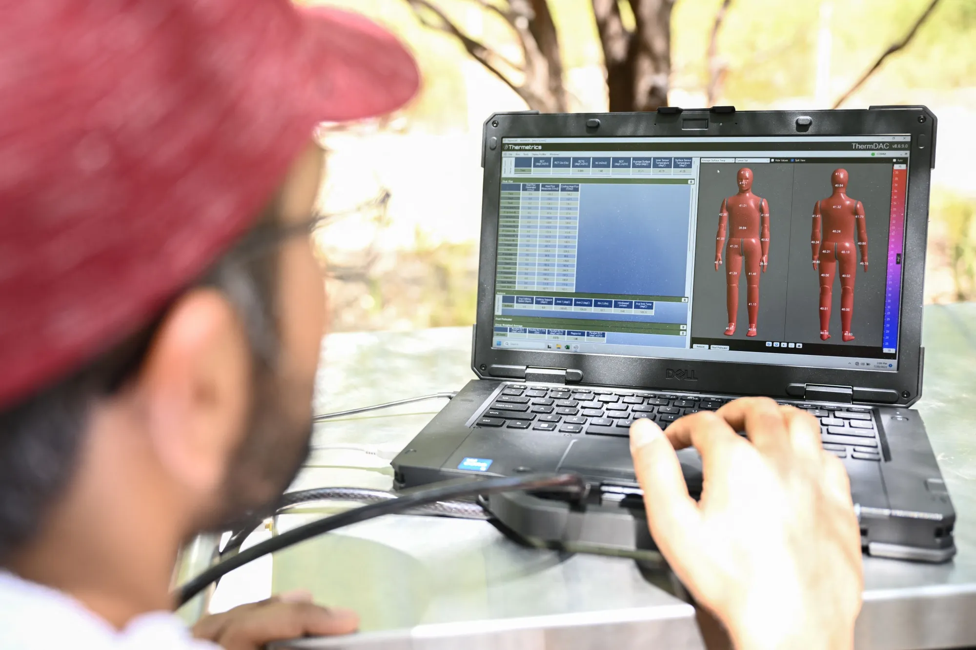 A researcher uses a computer program&nbsp;to study the effect of heat exposure on the human body&nbsp;in Phoenix, Arizona, in July.