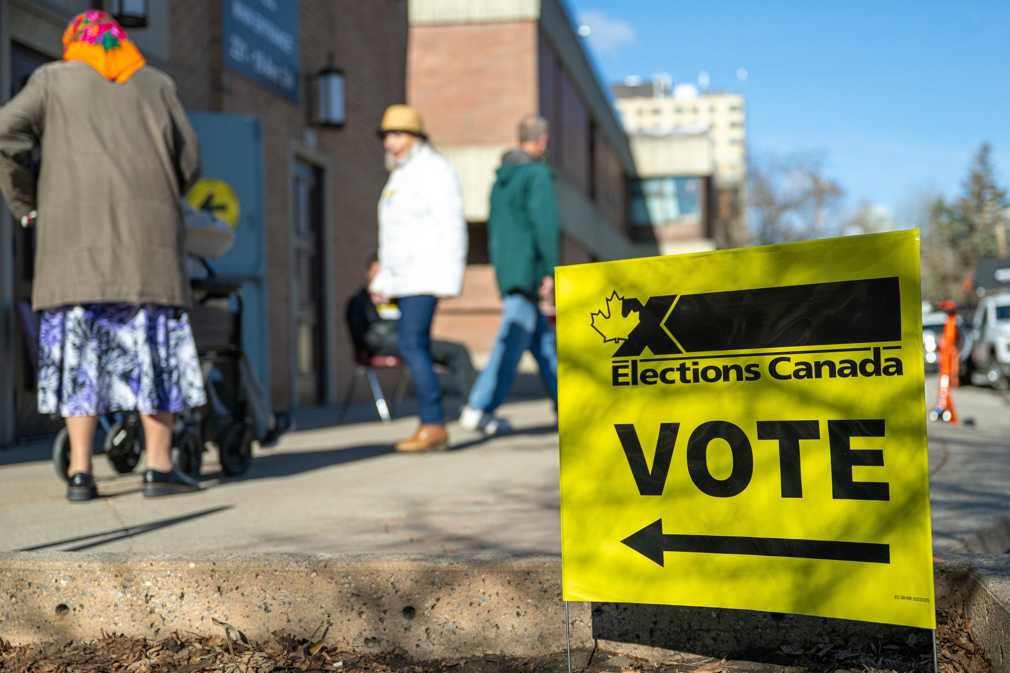 Voters enter a polling location during a federal election in Calgary, Alberta, on April 28.