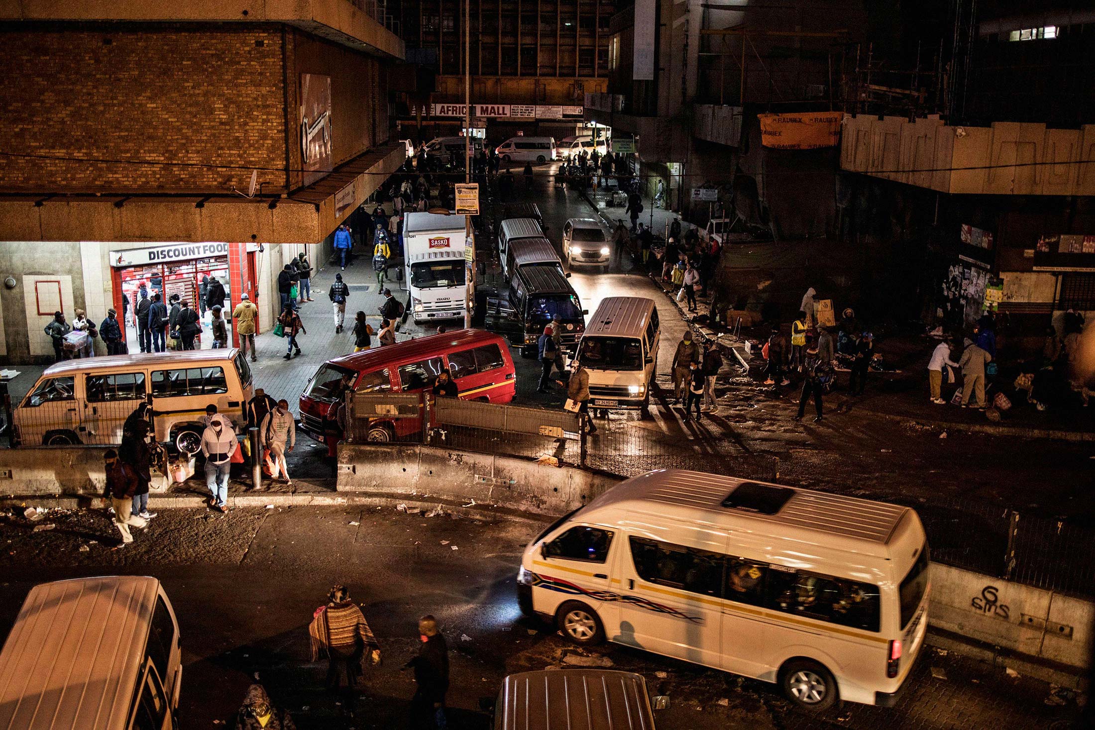 Commuters crowd the area surrounding the Noord taxi rank in Johannesburg&nbsp;on June 1.