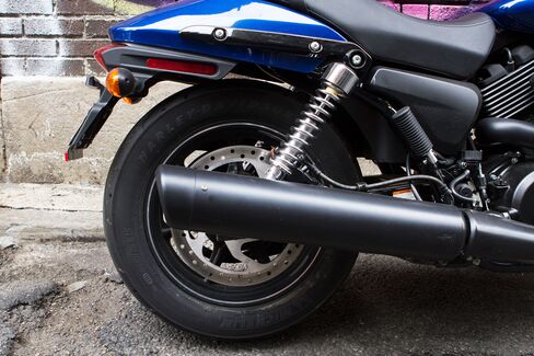The rear of the bike has a single upturned exhaust pipe off the 749cc engine.
