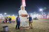 Pilgrims with a cutout of Modi