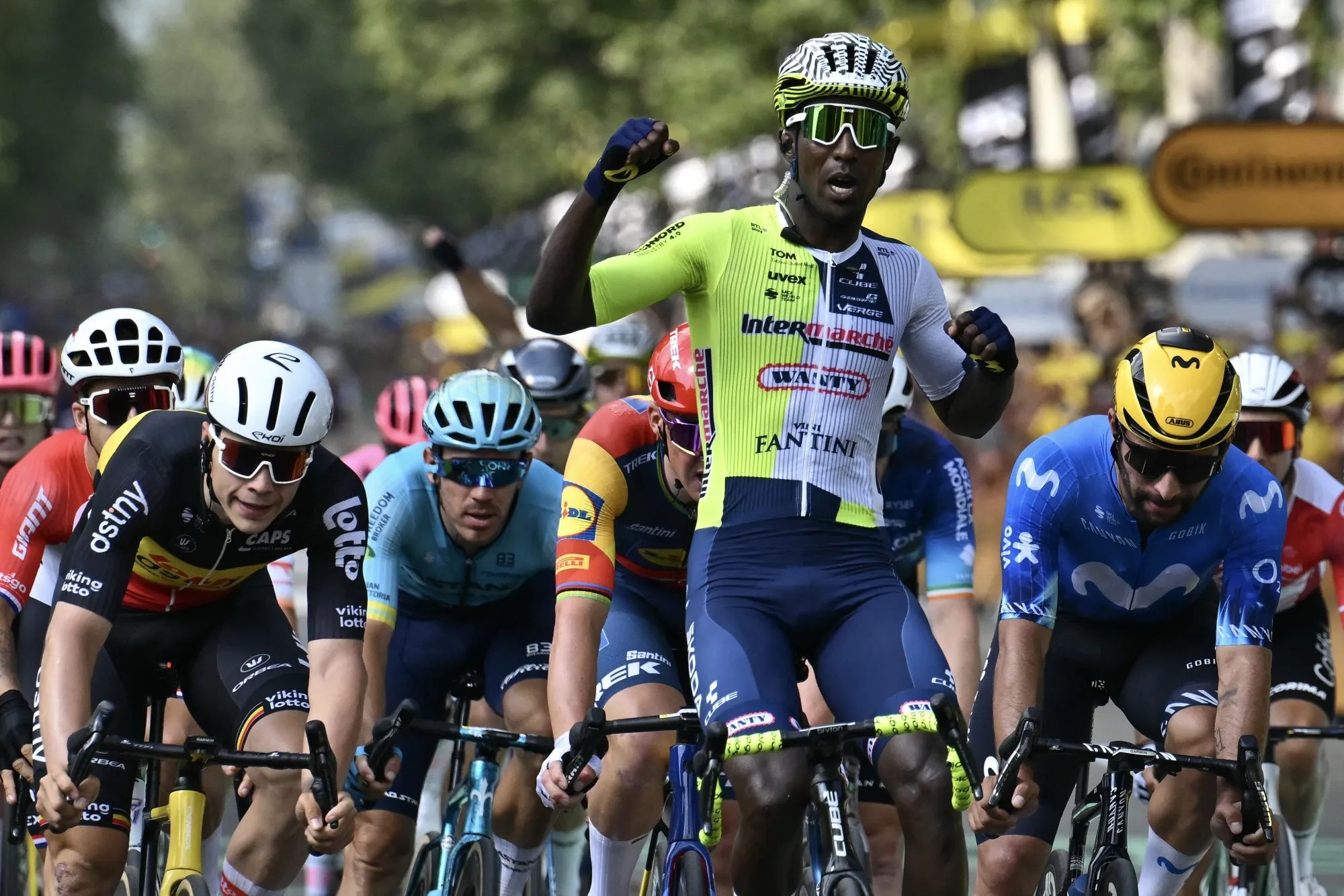 Biniam Girmay cycles to the finish line&nbsp;to win the 3rd stage of the Tour de France on July 1.