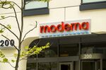 Signage is displayed on the Moderna Inc. headquarters in Cambridge, Massachusetts.