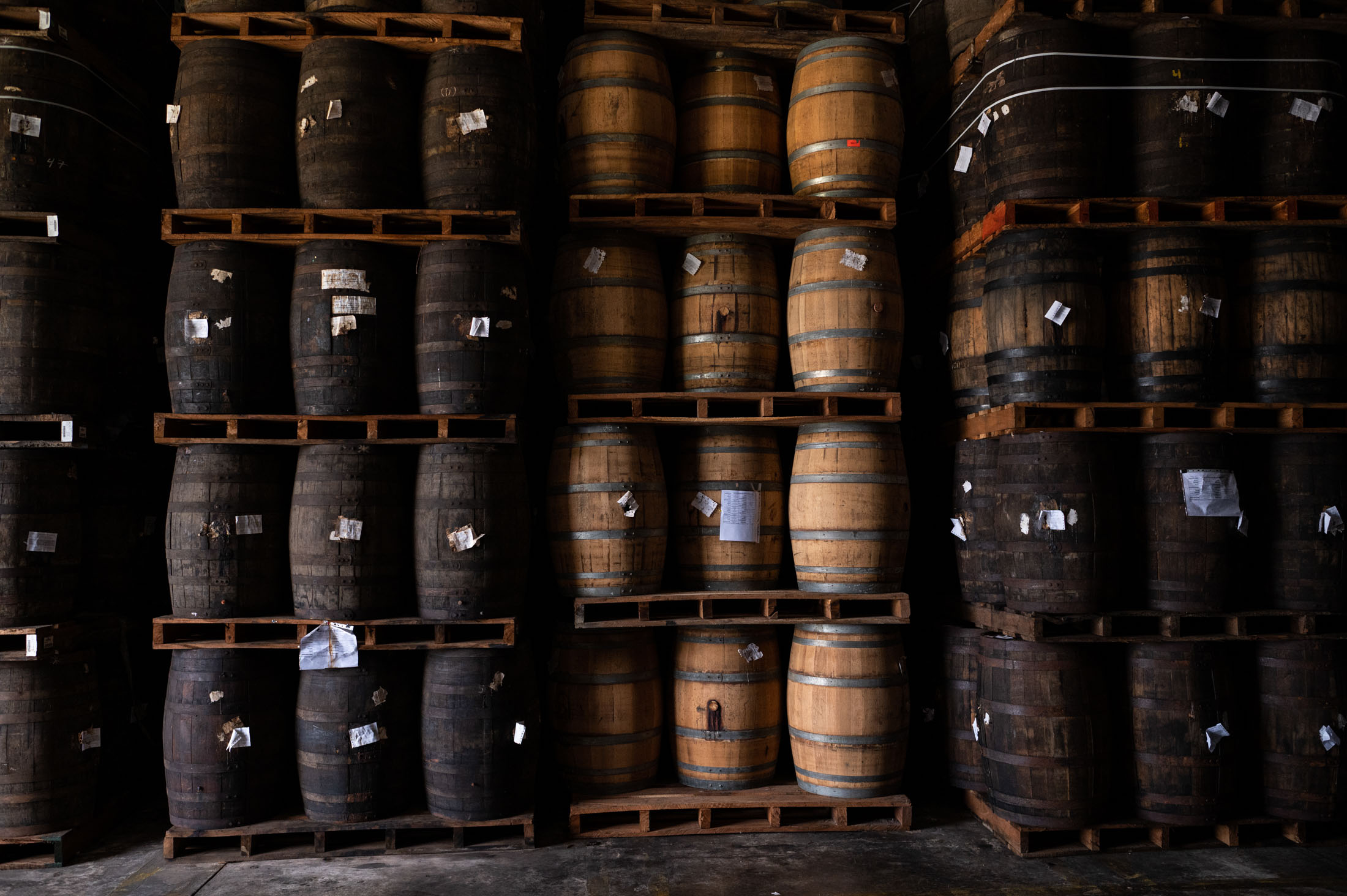 Oak barrels filled with rum at the distillery.(Gaby Oraa/Bloomberg)