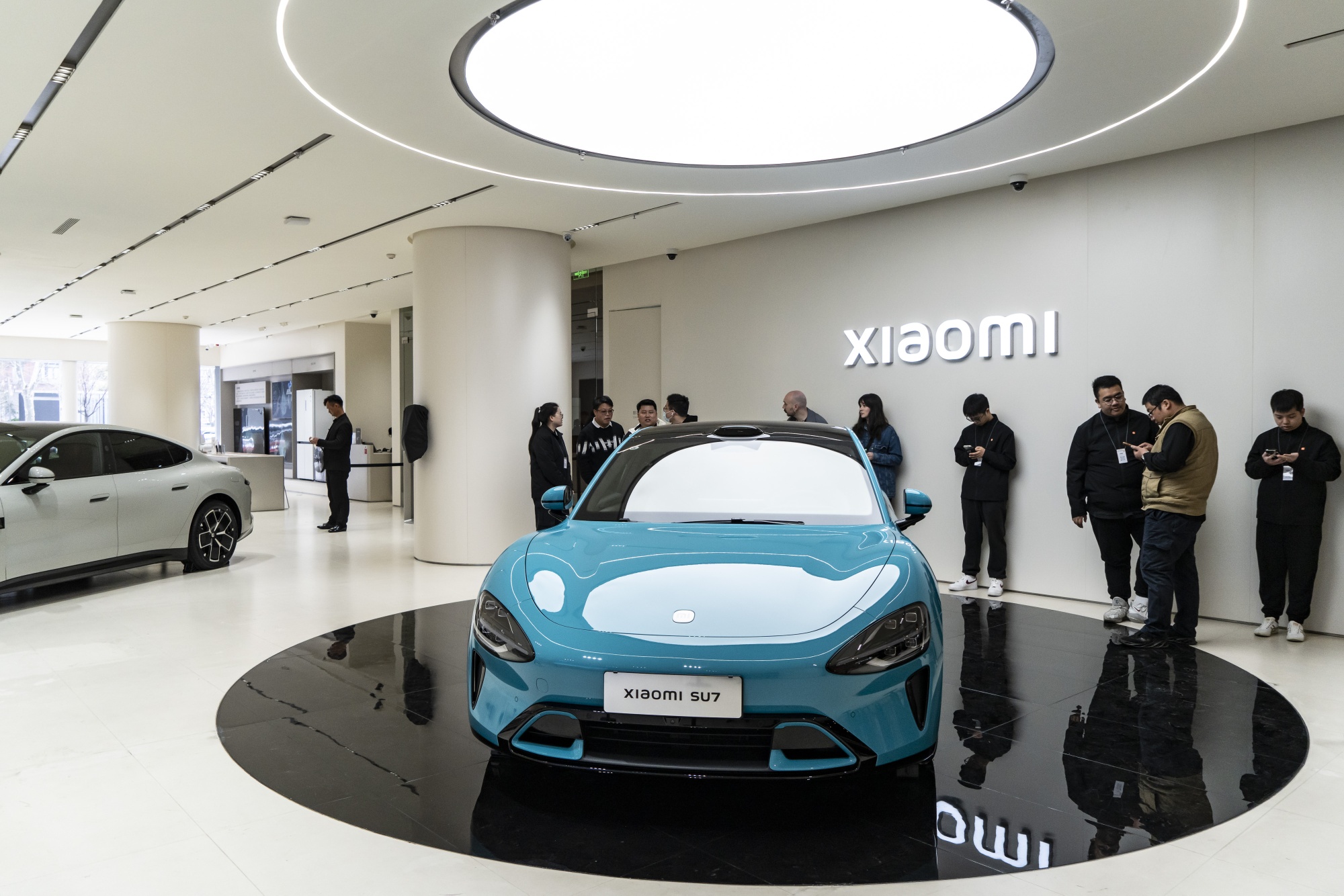 Xiaomi SU7 Electric Vehicle On Display at Stores