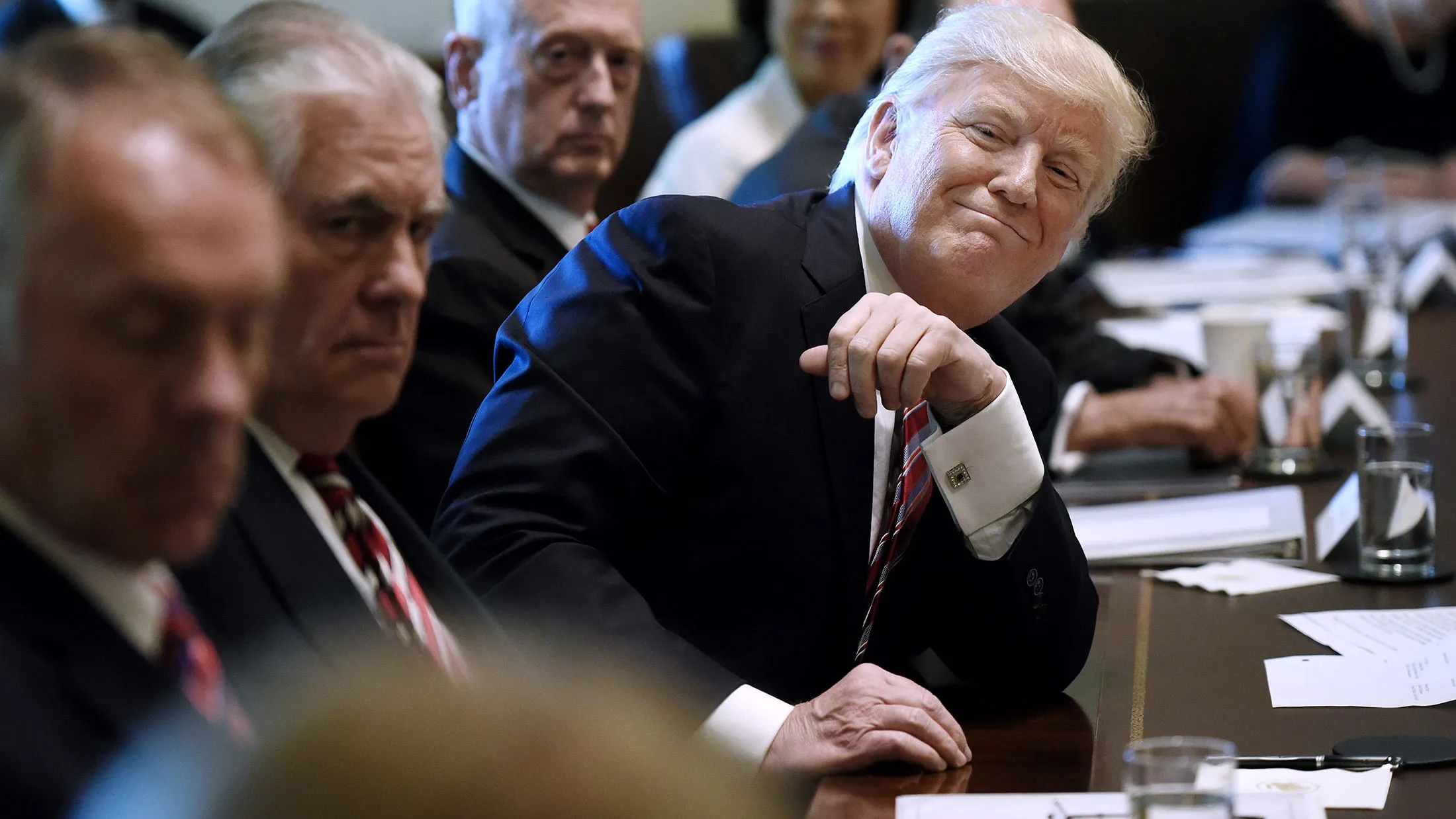 President Donald Trump attends a meeting in the Cabinet Room of the White House on June 12, 2017, in Washington.
