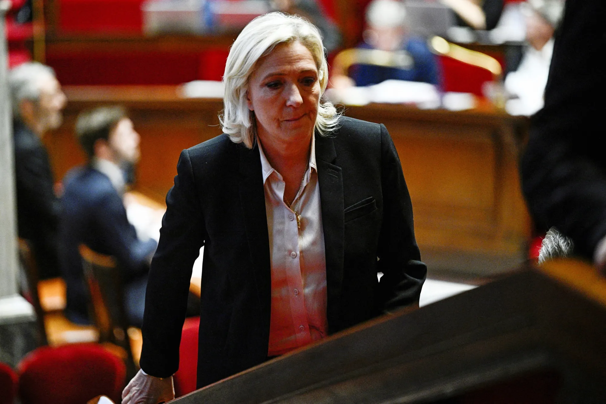 Marine Le Pen’s party could support a no-confidence motion from leftist lawmakers to bring down the government.