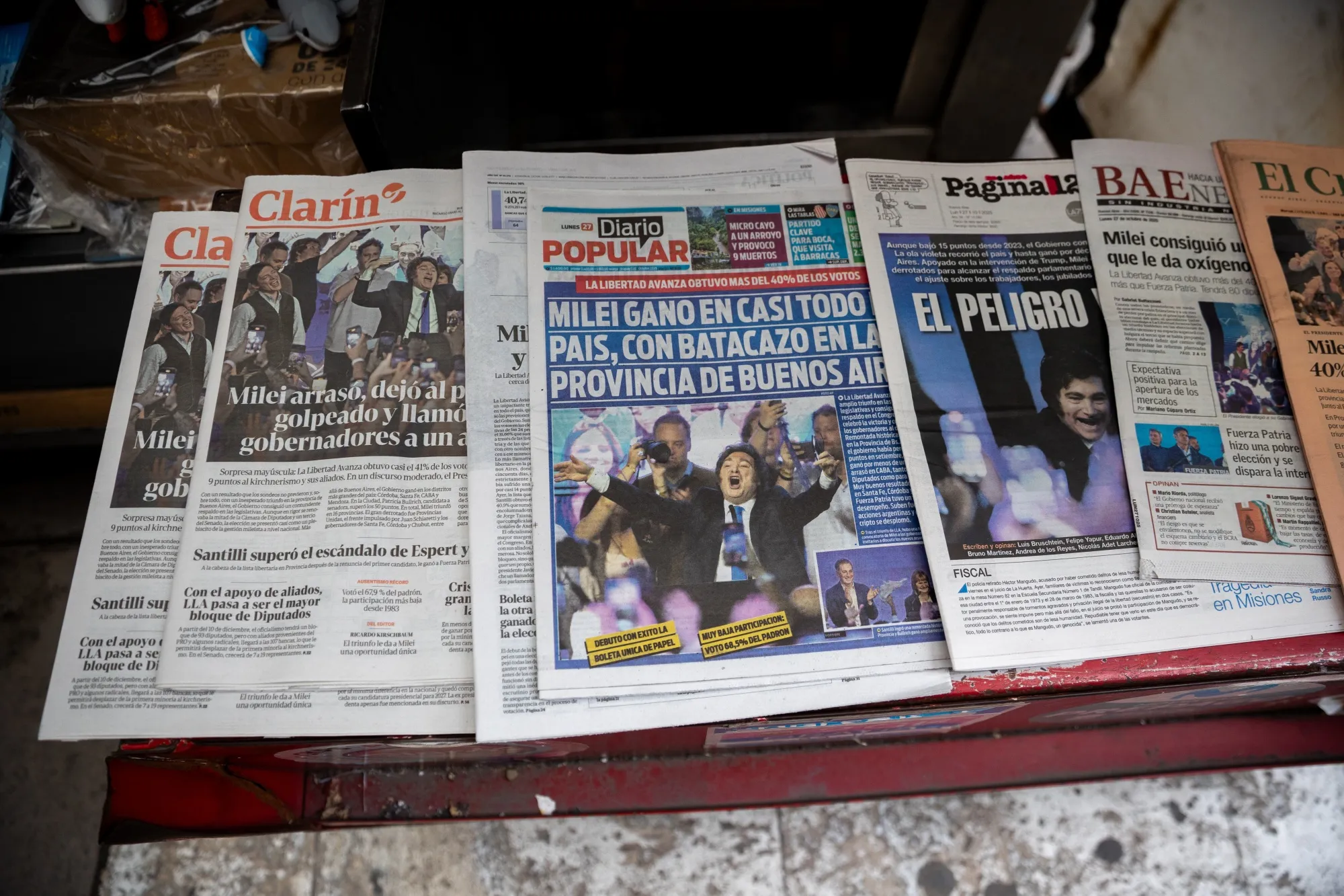 Newspapers show coverage of Argentina's midterm election results in Buenos Aires on Oct. 27.