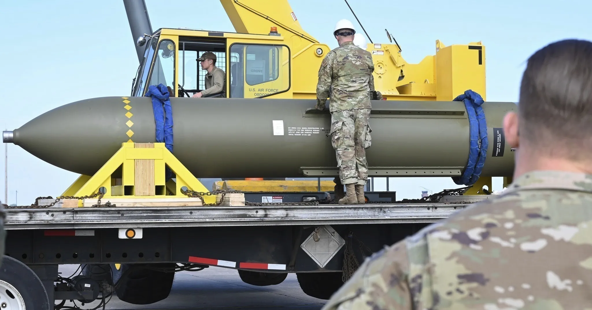 Airmen look at a GBU-57, or the Massive Ordnance Penetrator bomb at Whiteman Air Base in Missouri, in a photo released by the US Air Force.