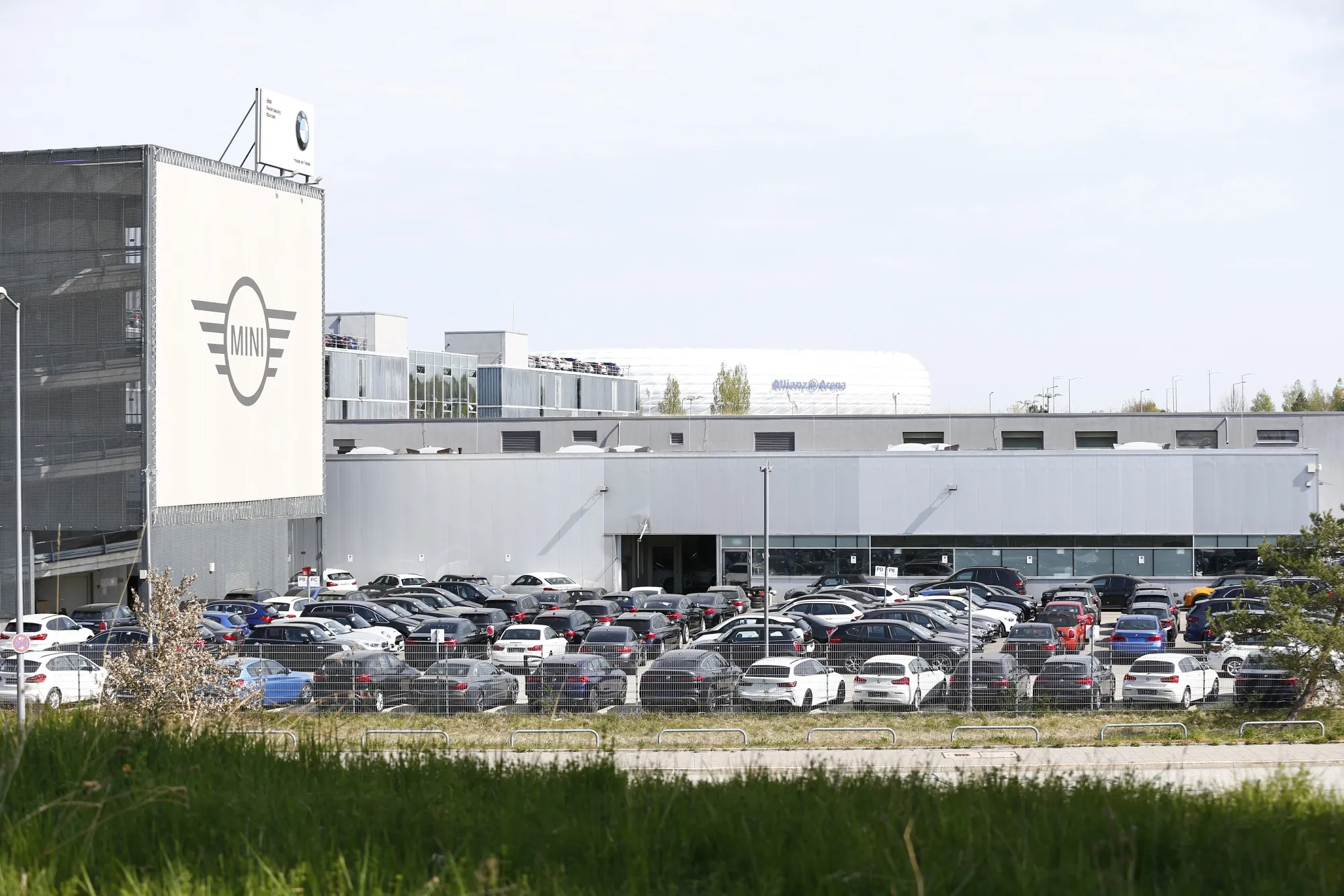 New automobiles sit in a storage yard outside the Bayerische Motoren Werke AG&nbsp; factory during coronavirus lockdown in Munich.