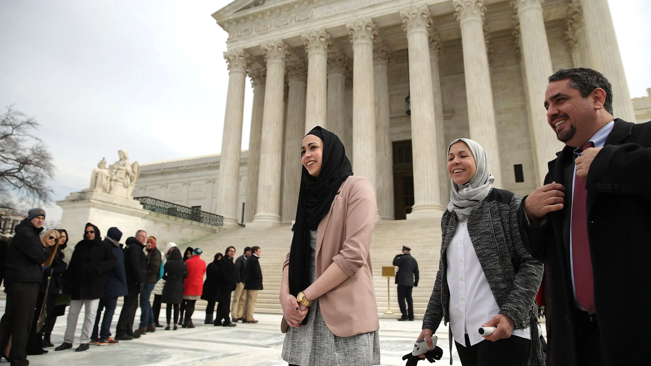 Samantha Elauf (center), her mother, Majda Elauf, and Equal Employment Opportunity Commission General Counsel David Lopez leave the U.S. Supreme Court after the court heard oral arguments in EEOC v. Abercrombie &amp; Fitch on Feb. 25, 2015, in Washington.

