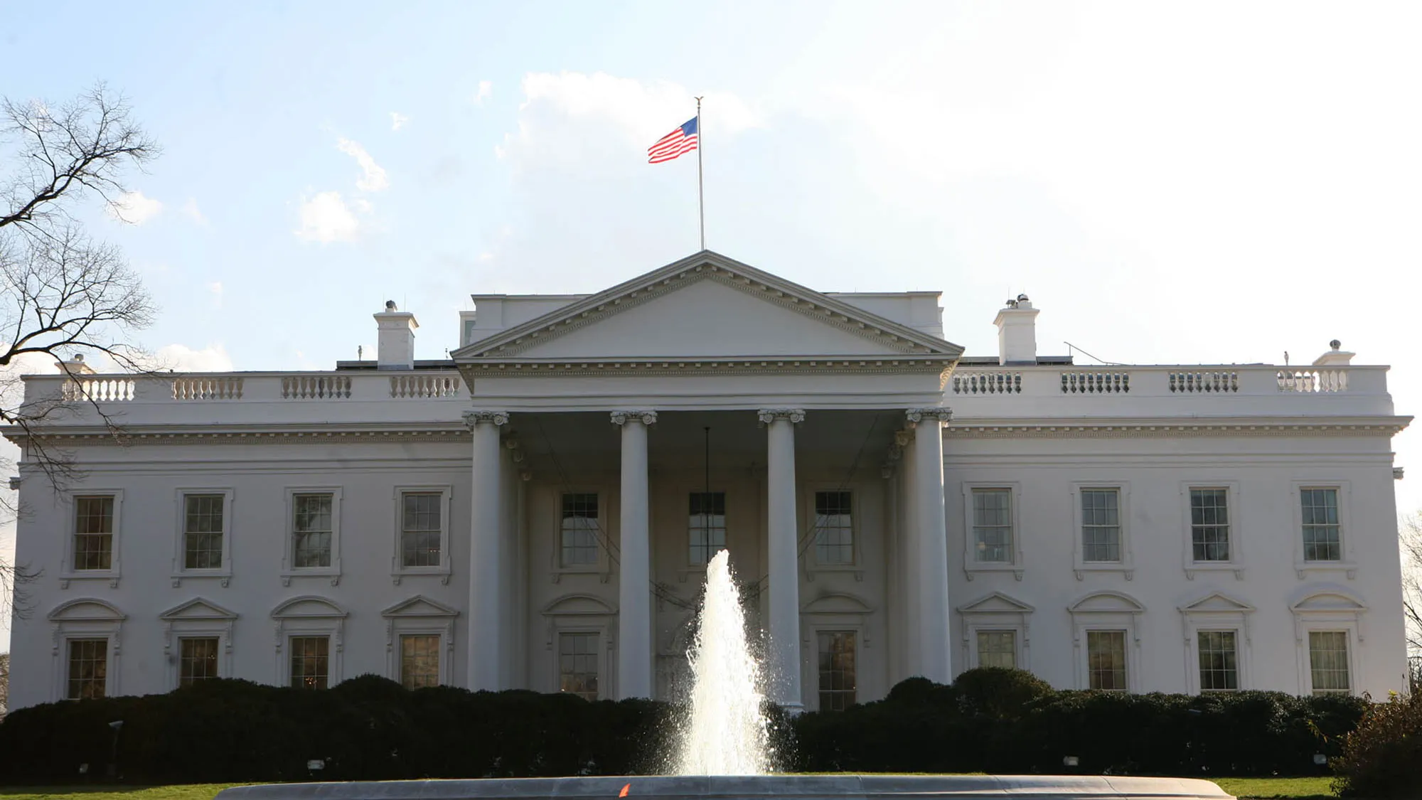 The United States flag flies at the top of the flag staff at the White House, Thursday afternoon, on January 25, 2007.
