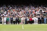 Former Wimbledon Champions pose for a photo at the Centre Court Centenary Celebration on July 3.