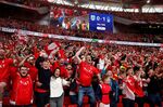 Nottingham Forest supporters celebrate victory at the end of their English Championship play-off final at Wembley Stadium in May.