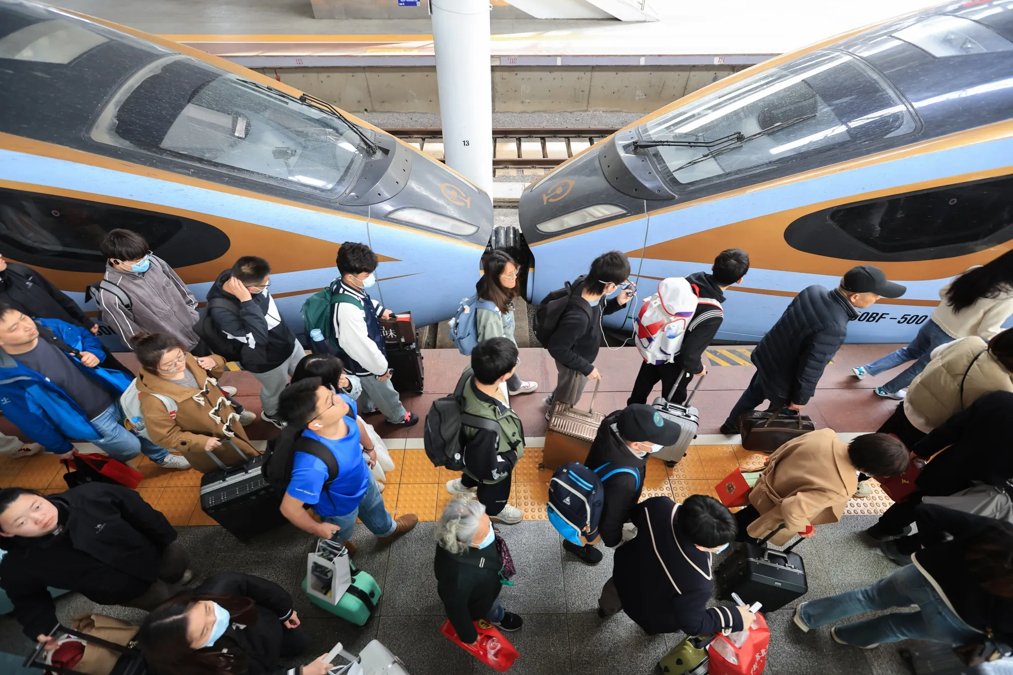 Passengers at Nanjing Railway Station on April 6.