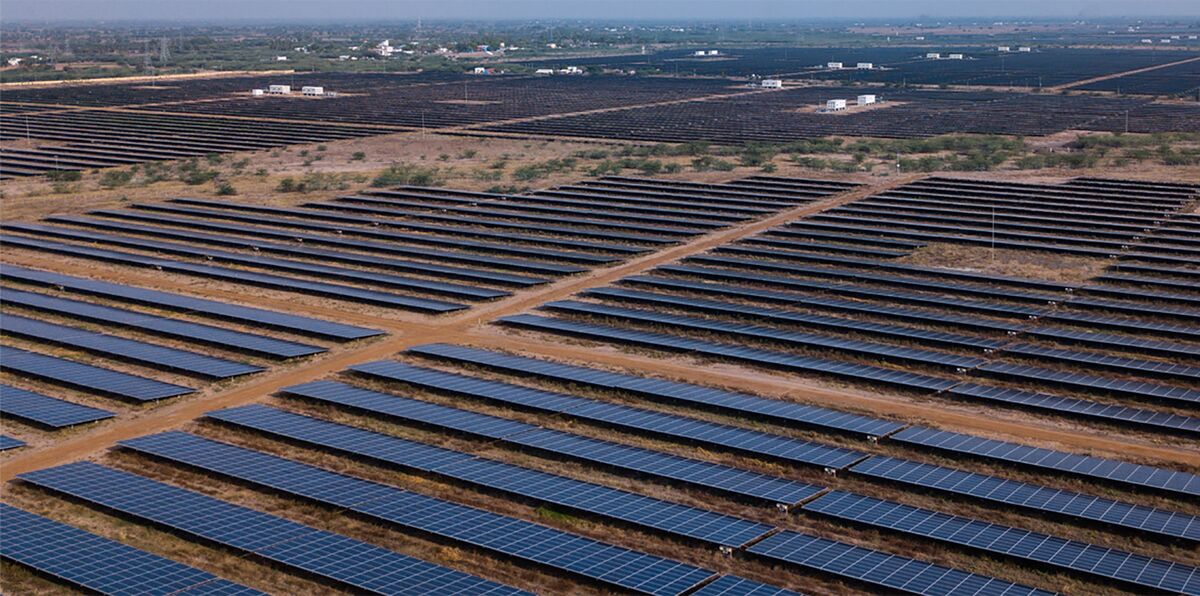 bloomberg.com - Baiju Kalesh - Adani Green Said in Advanced Talks for SoftBank-Backed SB Energy
