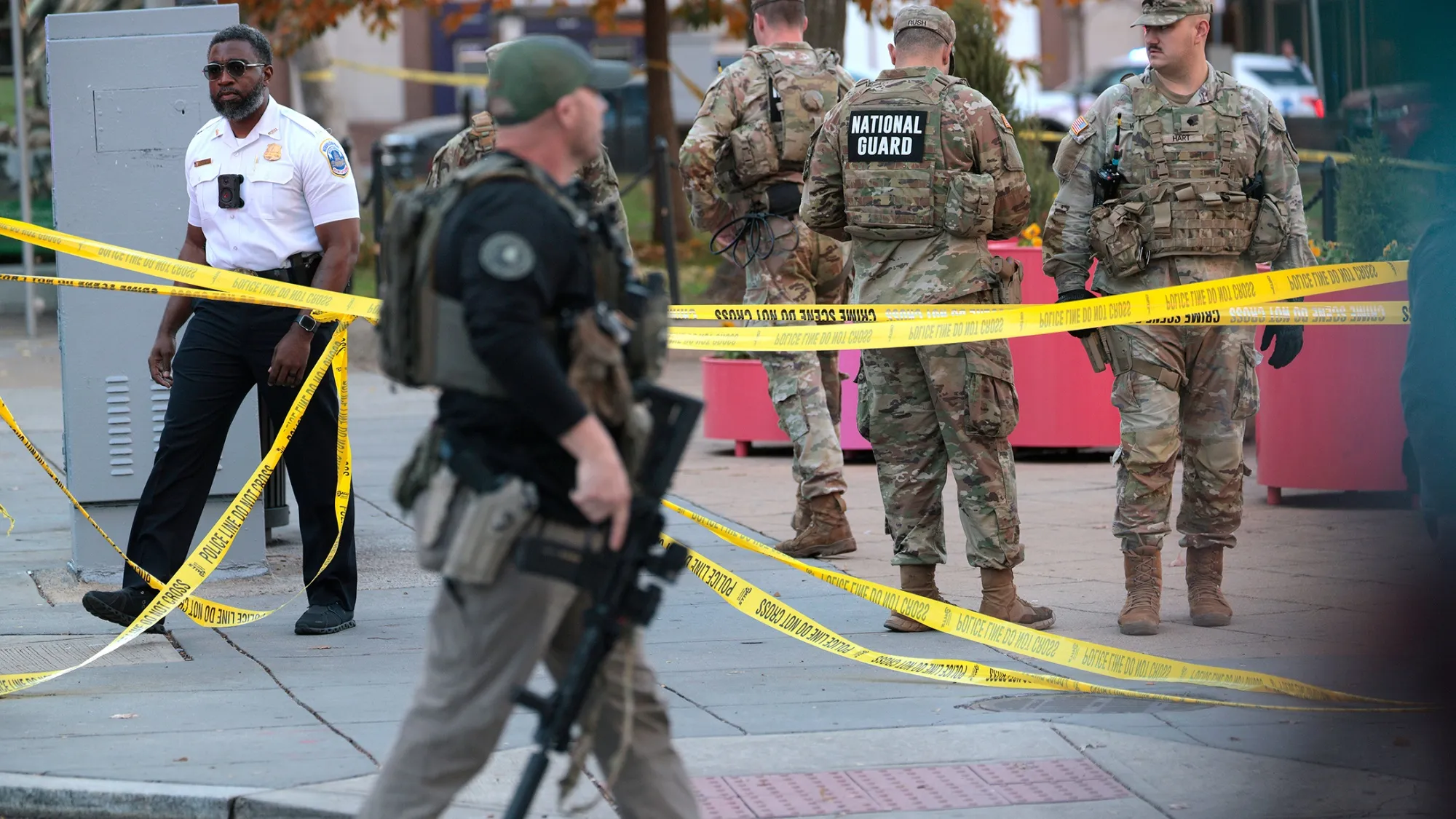 Law enforcement and National Guard troops respond to a shooting near the White House on Nov. 26.