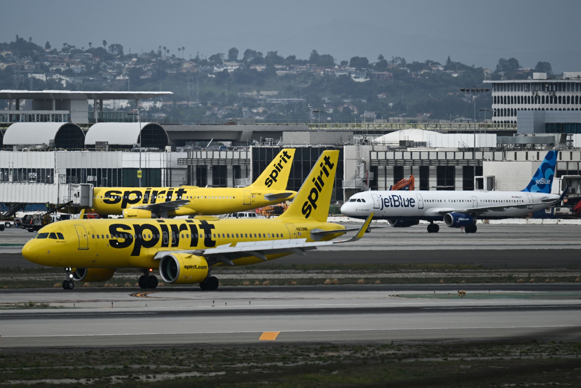 American Airlines rides travel boom to $1.3 billion profit in the second  quarter as fuel prices drop