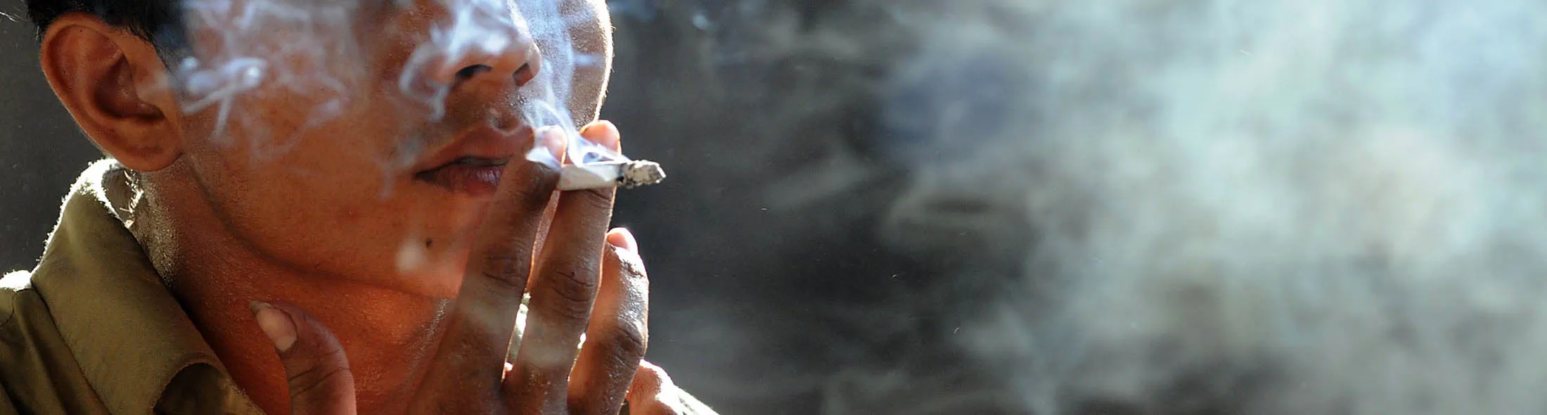 A Pakistani man smokes a cigarette in Lahore on May 31, 2011, on 'World No Tobacco Day'. Pakistan accounts for a large proportion of the cigarettes consumed in South Asia where about 100,000 people die annually from diseases caused by the use of tobacco, reports the Coaltion of Tobacco Control in Pakistan. AFP PHOTO/ARIF ALI (Photo credit should read Arif Ali/AFP/Getty Images)
