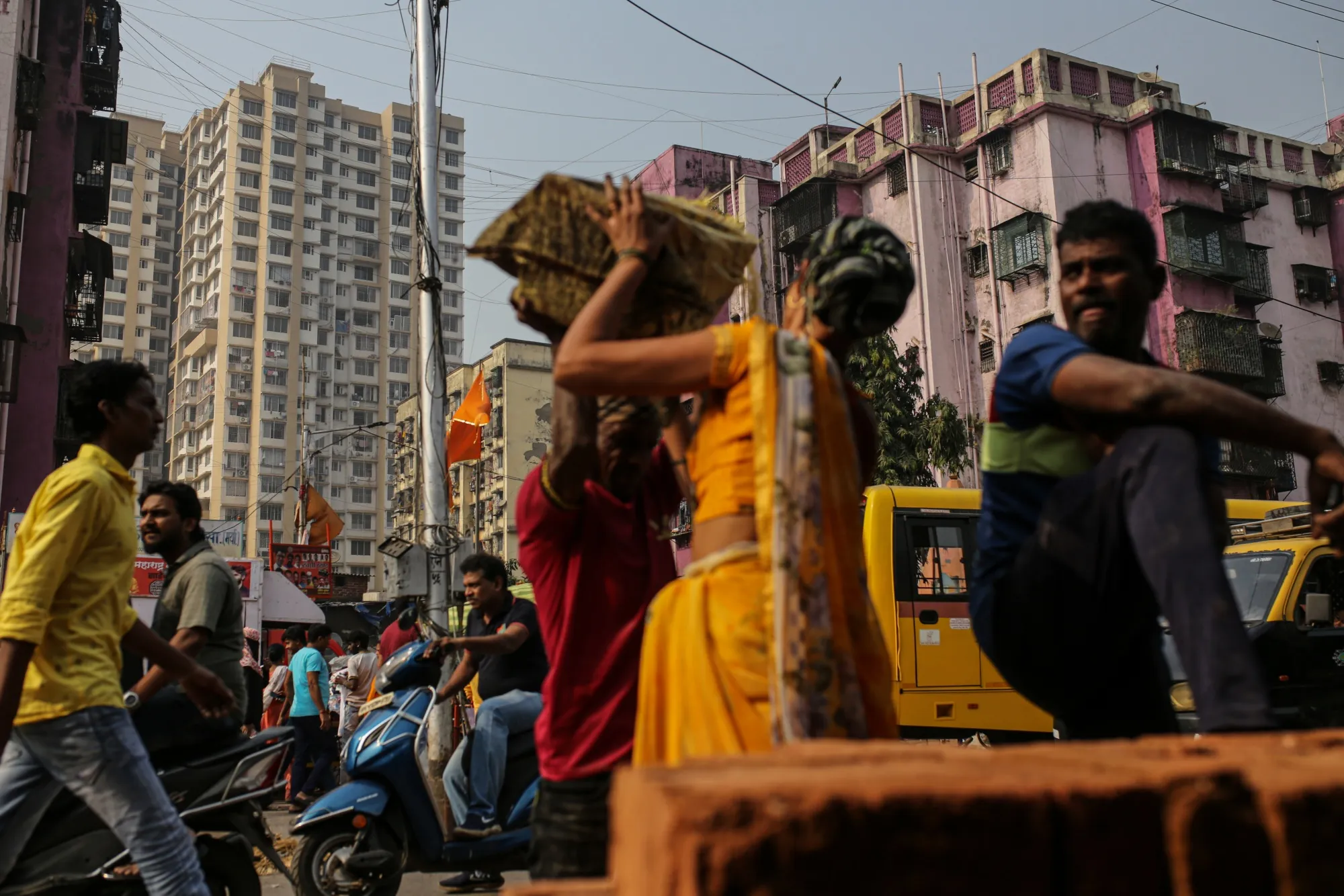 In the Dharavi district in Mumbai, India, newer residential high-rises tower over older buildings.&nbsp; &nbsp;