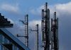 BERLIN, GERMANY - JANUARY 02: A cellular phone tower stands on top of an office building on January 02, 2019 in Berlin, Germany. Germany's mobile phone service providers are taking German regulators to court over conditions regulators are seeking to impose to issue licenses for the new 5G mobile data networks. Deutsche Telekom, Vodafone and Telefonica are unhappy about the requirement that regulators want them to share their cellular phone towers with competitors. (Photo by Sean Gallup/Getty Images)
