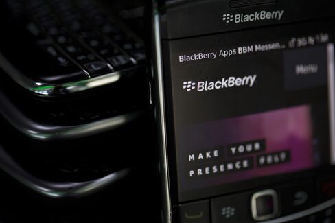 BlackBerry Logo Sits on the Screen of a BlackBerry Smartphone