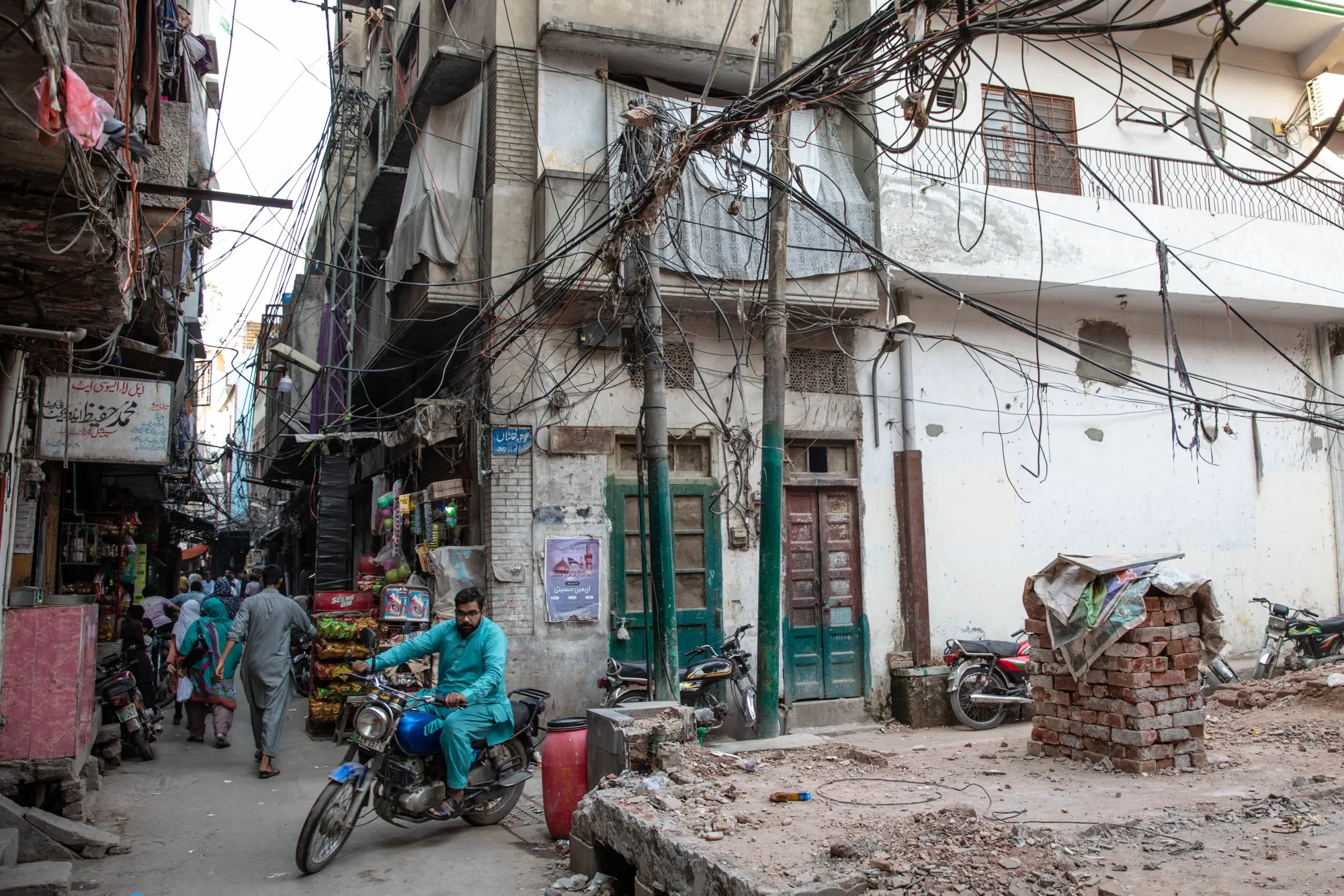 Power lines hang above a street in Lahore.