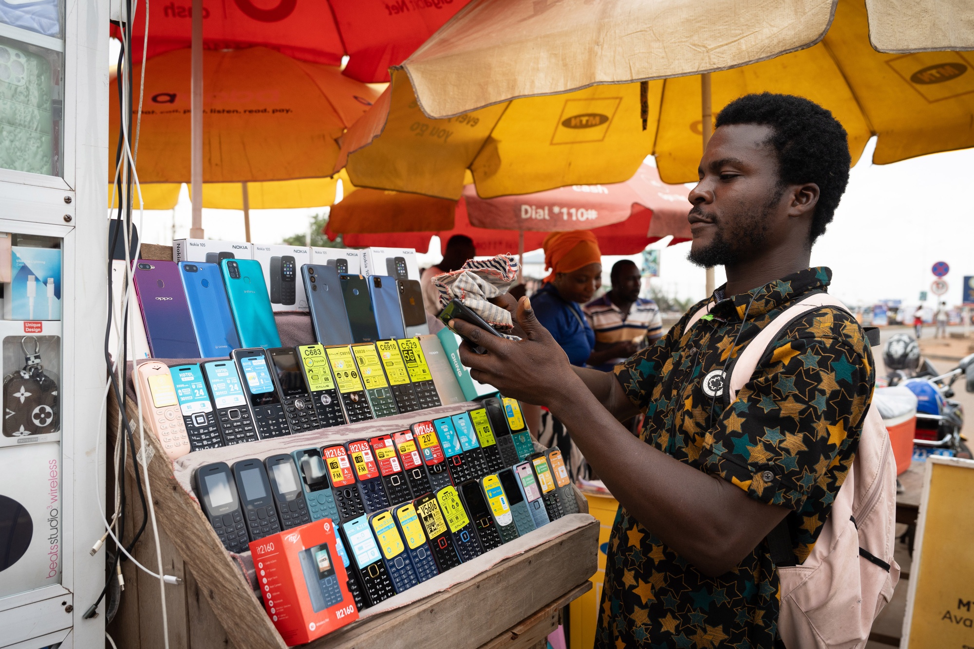 A mobile phone vendor in Accra, Ghana.