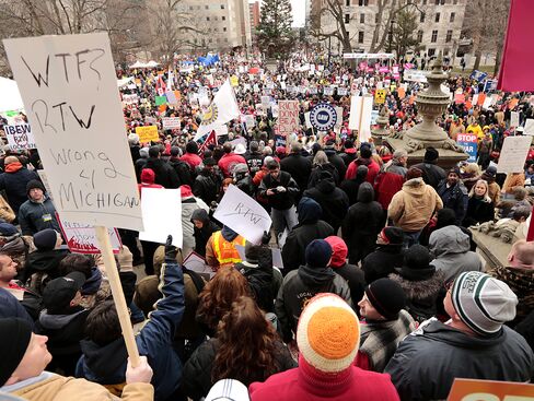 Throngs Fill Michigan’s Capitol to Protest Union-Dues Bills