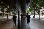 A pedestrian on California Street in the financial district of San Francisco, California, U.S., on Monday, May 9, 2022.