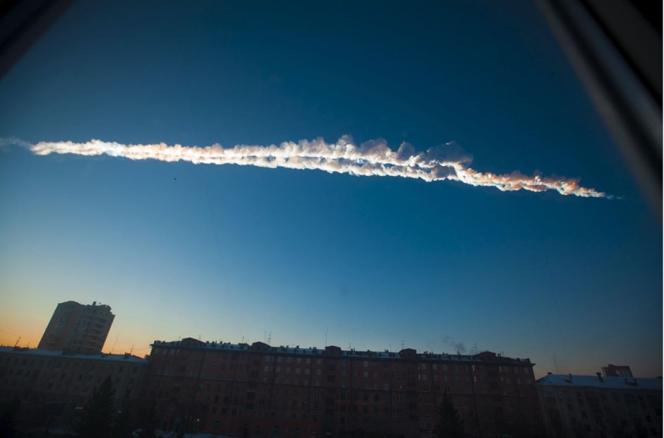 A smoke trail hovers after last year's Chelyabinsk meteorite, which injured more than a thousand people.