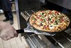 Operations At A Domino's Pizza Inc. Location As Earnings Are Released 
