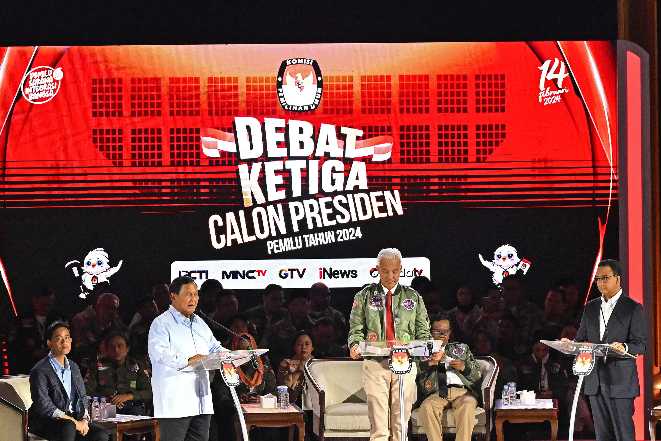 Prabowo Subianto, from left, Ganjar Pranowo, and Anies Baswedan attend the third presidential debate in Jakarta on Jan. 7.