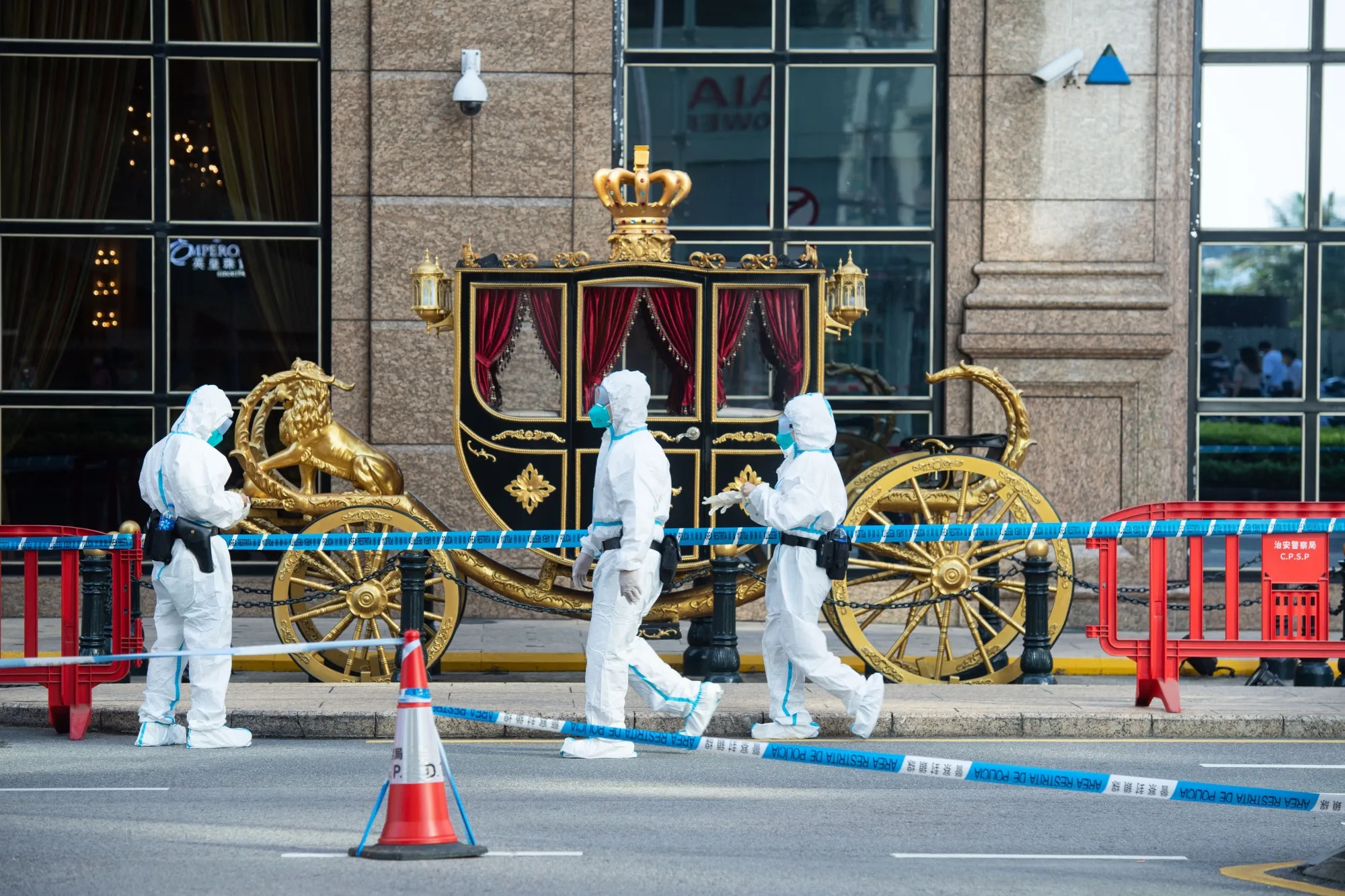 Police officers&nbsp;inside the blockaded area around a hotel in Macau on&nbsp;Oct. 4.