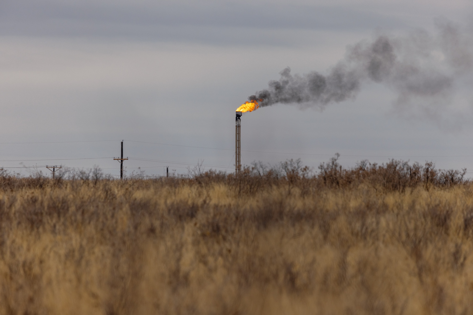 A natural gas flare stack at an oil well in Midland, Texas.