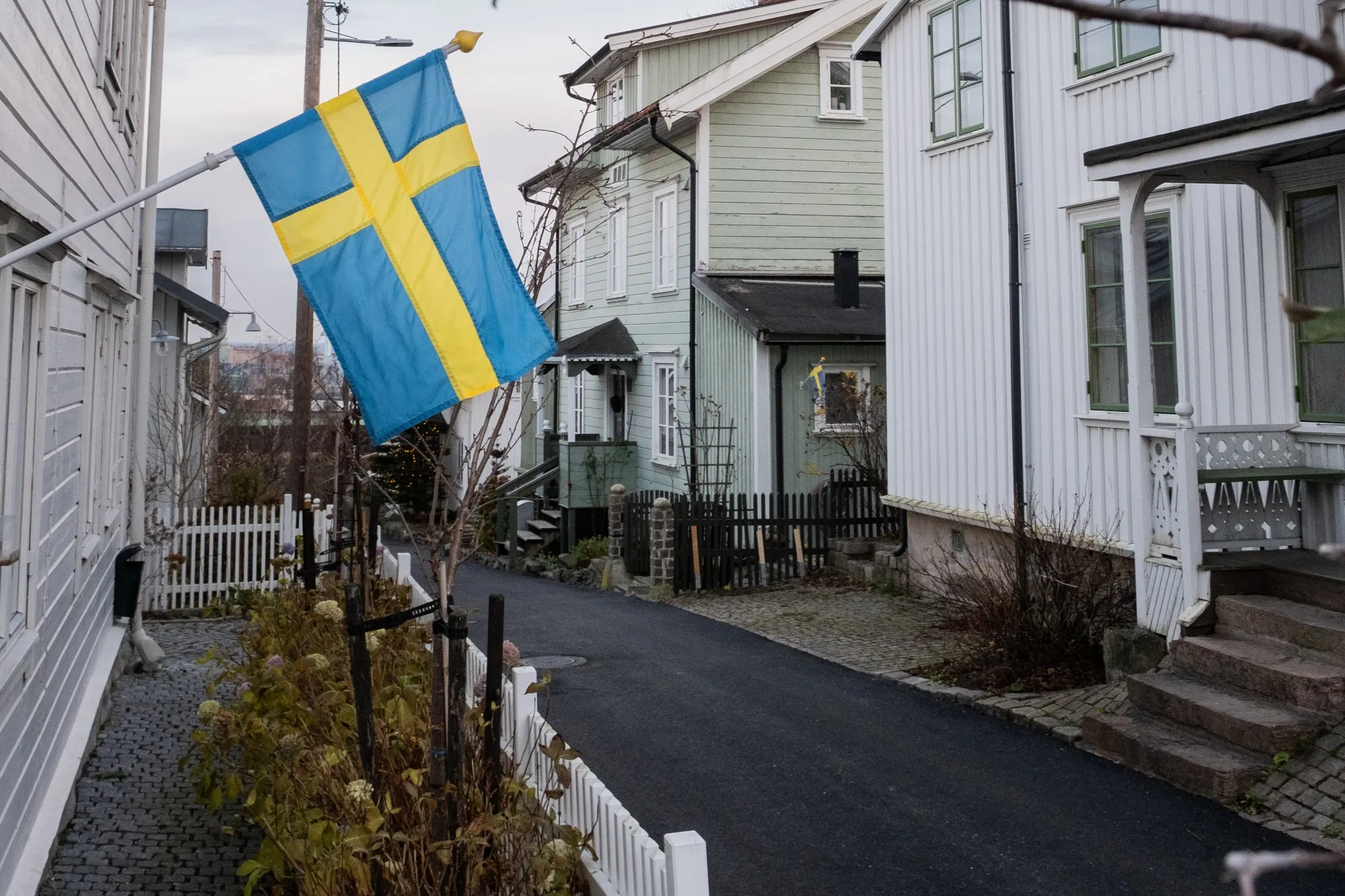 A Swedish national flag outside a detached house in Gothenburg.