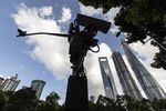 Surveillance cameras in the Lujiazui business district in Shanghai.