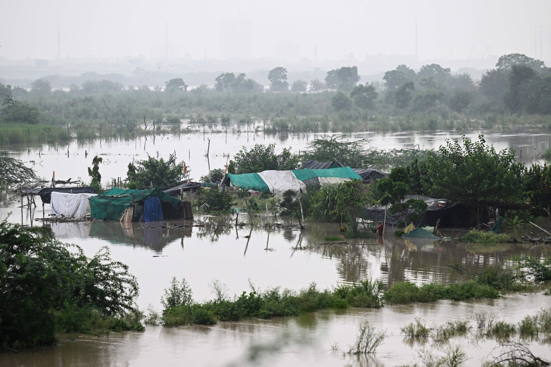 Heavy Floods In Northern India Take Hydropower Plants Offline - Bloomberg