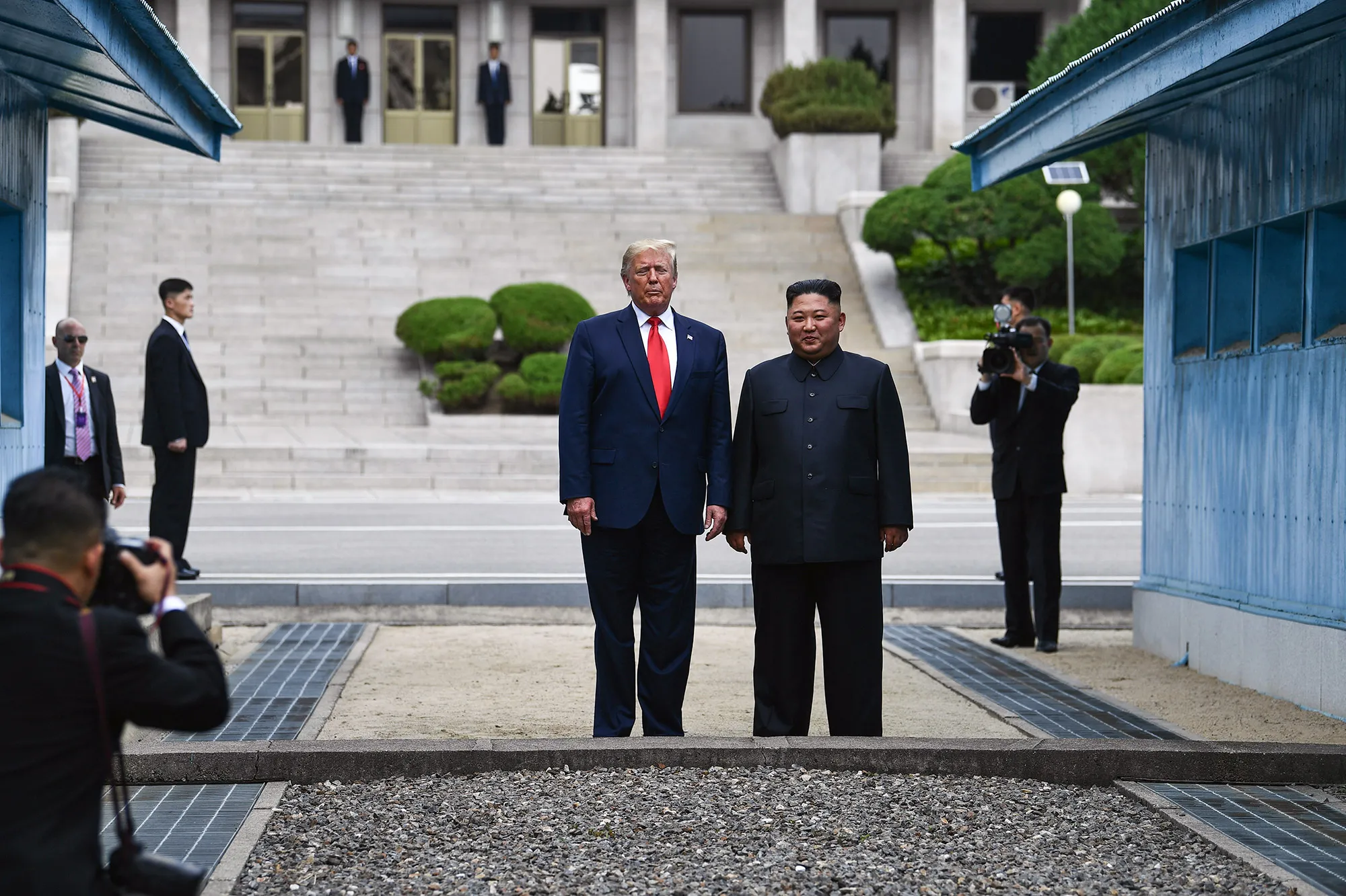 North Korean&nbsp;leader Kim Jong Un stands with U.S. President Donald Trump north of the Military Demarcation Line that divides North and South Korea on June 30.