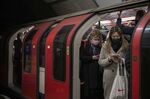 Commuters on a London Underground train at Bank station in London, on Nov. 30.